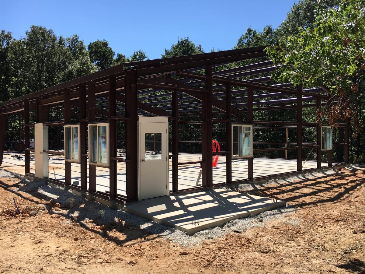 contractors erecting pre-engineered metal workshop building