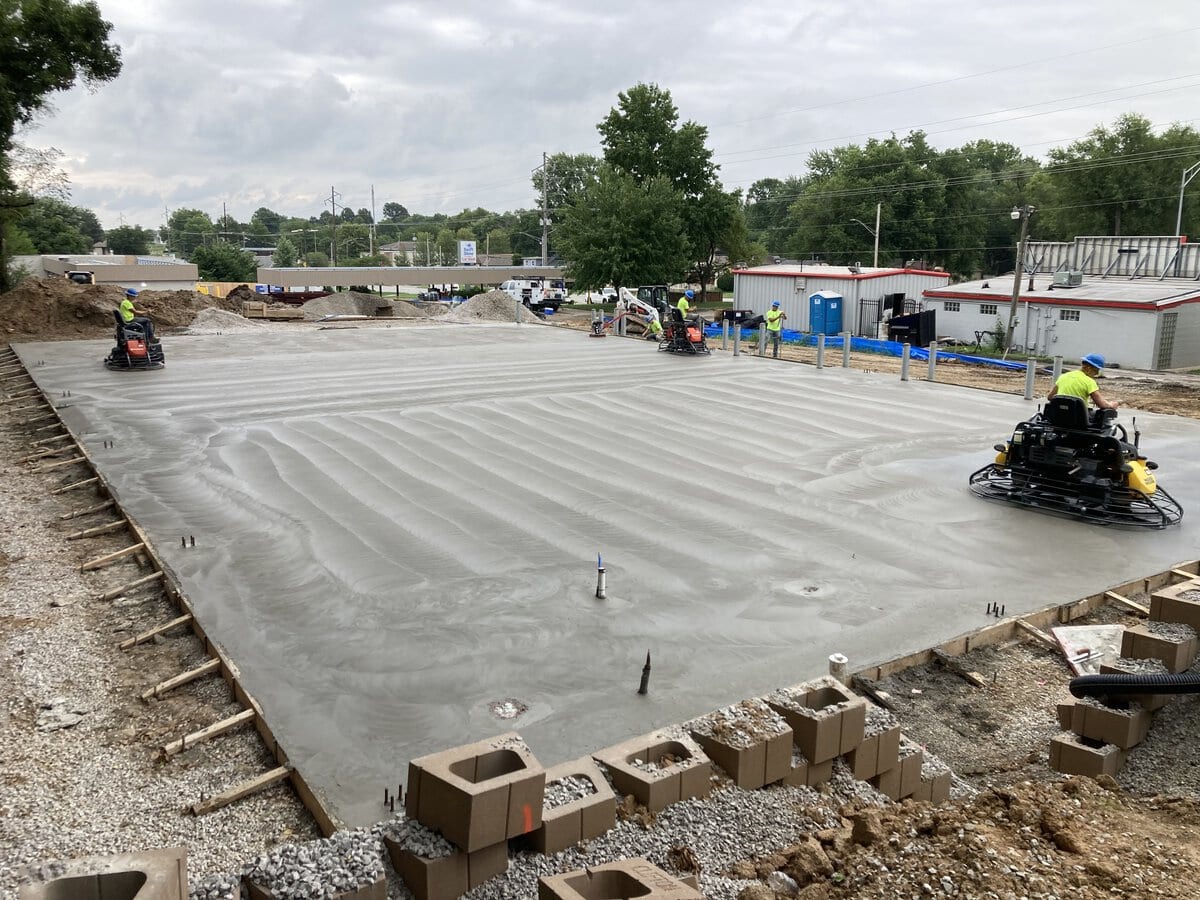 concrete foundation being prepared for metal library building