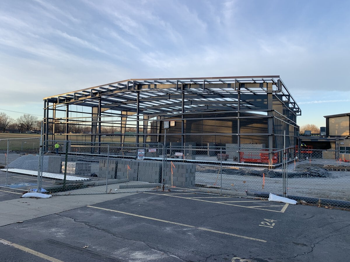 metal building contractors erecting prefab recreational building