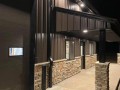 brian sollars pre-engineered building entrance at night