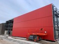 installing crimson red stucco textured wall panels