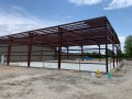 erecting pre-engineered metal building on concrete slab