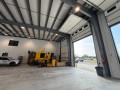 large construction equipment storage metal building