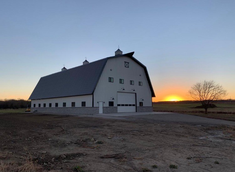 lavender family ranch barn style pre-engineered metal building at sunset lavender family ranch barn style pre-engineered metal building at sunset