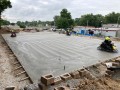 pouring concrete pad for pre-engineered metal building