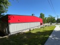 side of pre-engineered metal building with custom siding