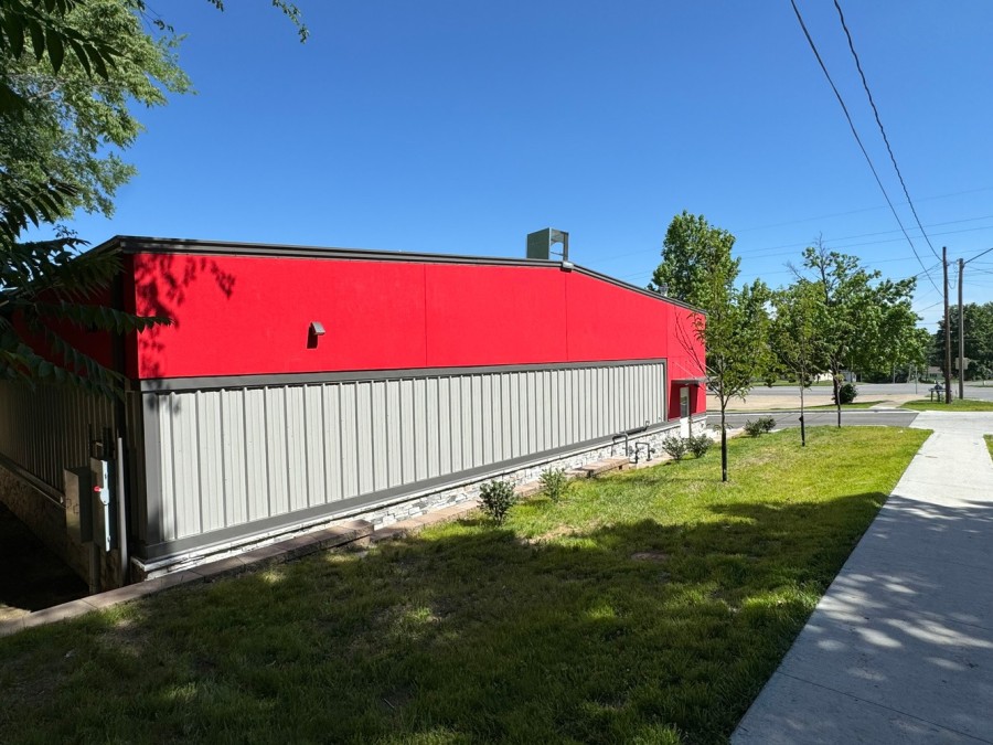side of pre-engineered metal building with custom siding side of pre-engineered metal building with custom siding