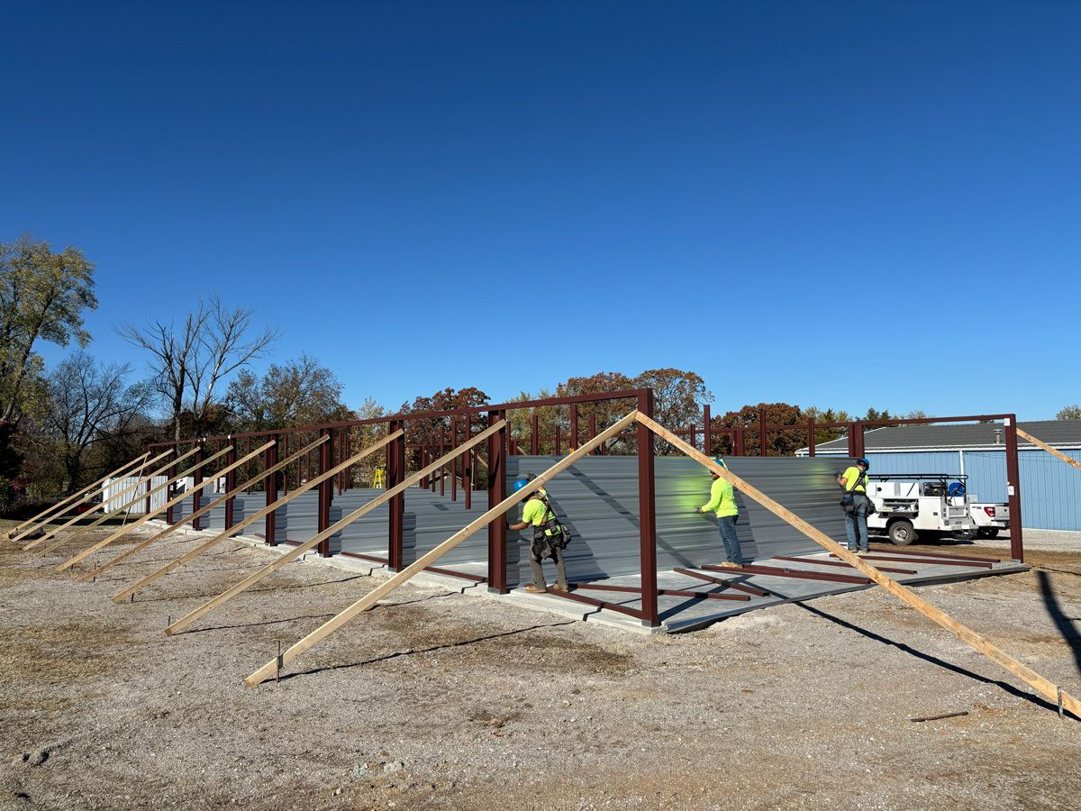 storage unit builders erecting steel building