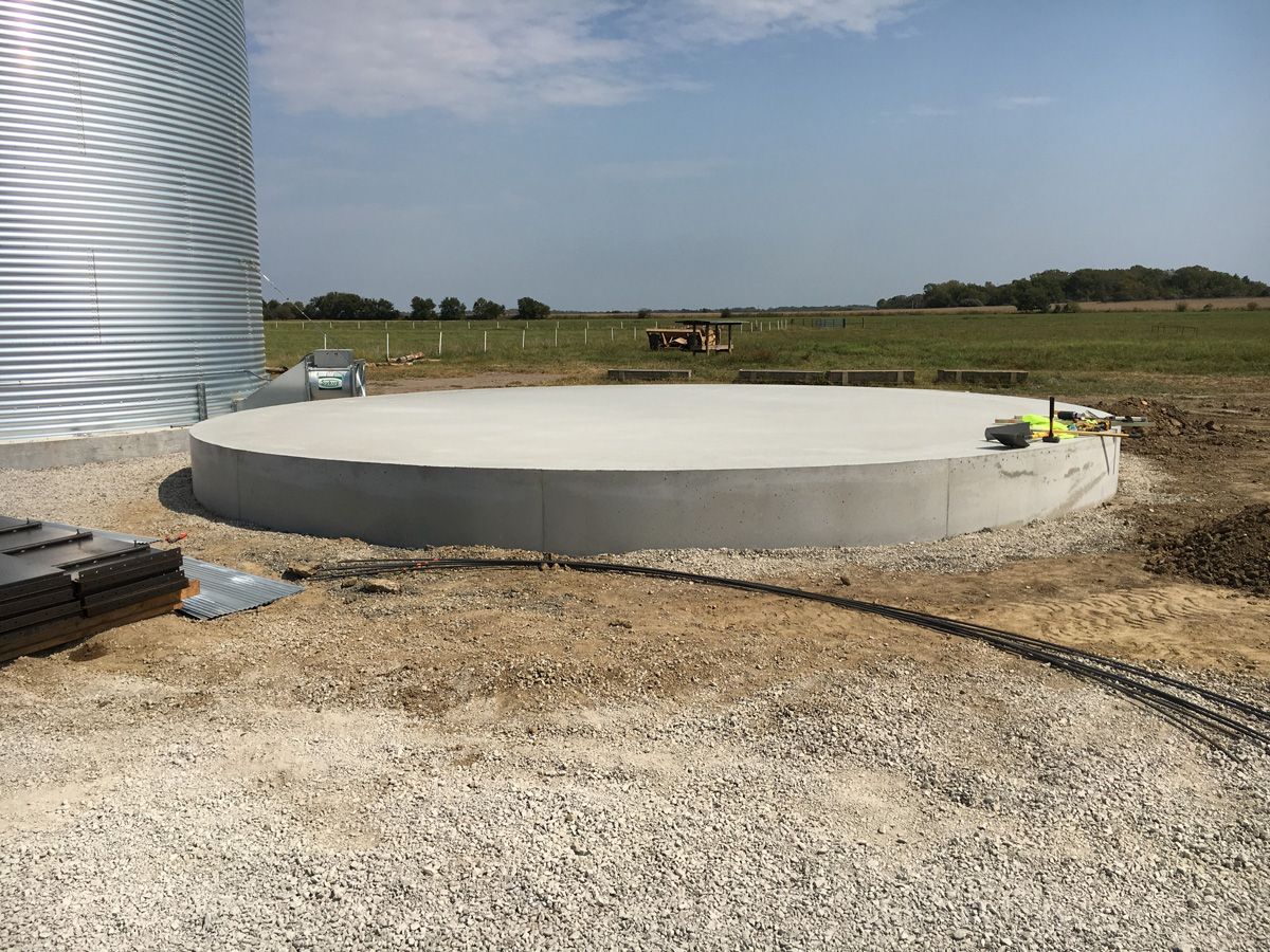 concrete foundation poured for grain bin installation