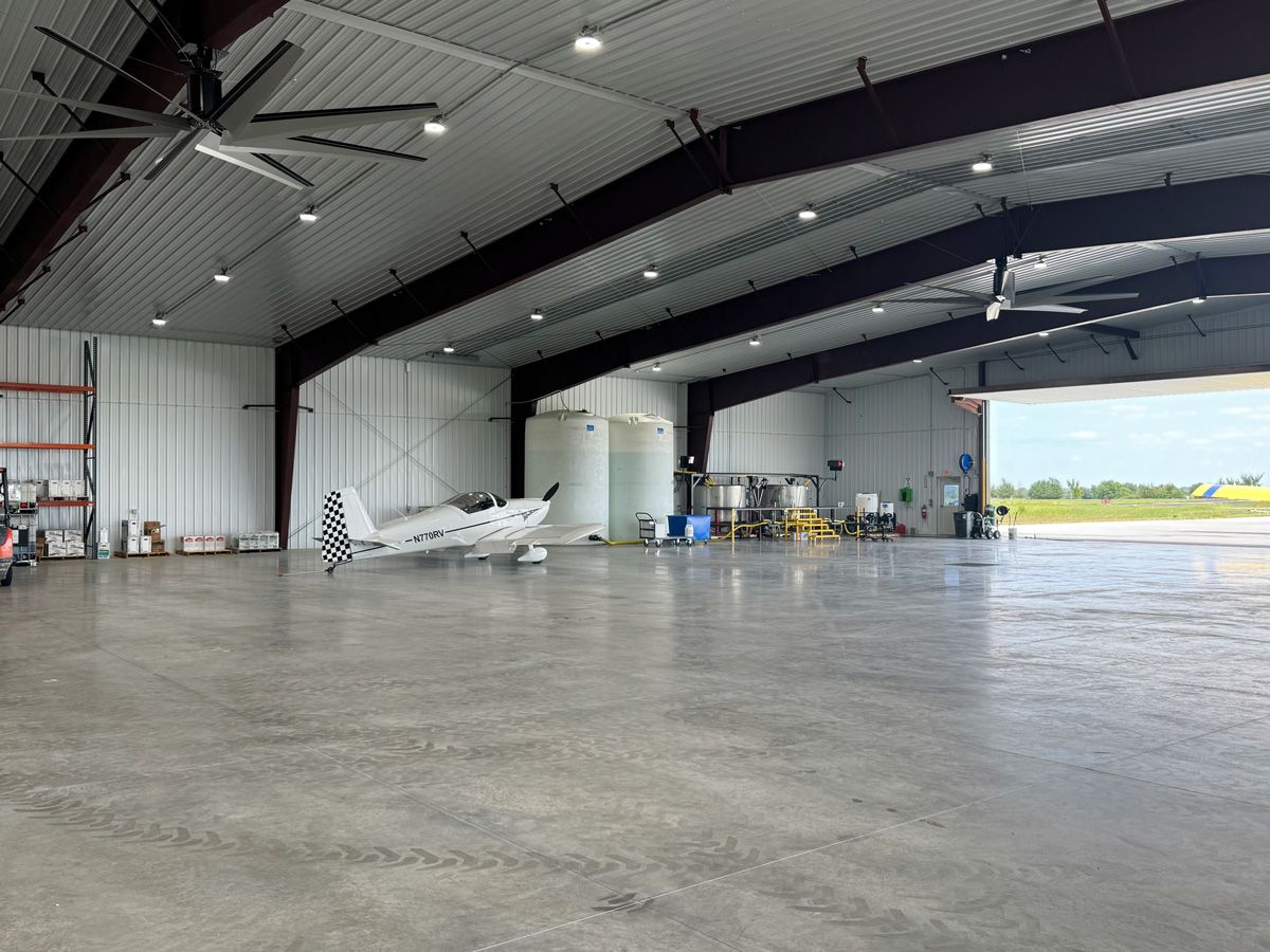 airplane hangar interior showcasing door and electrical features