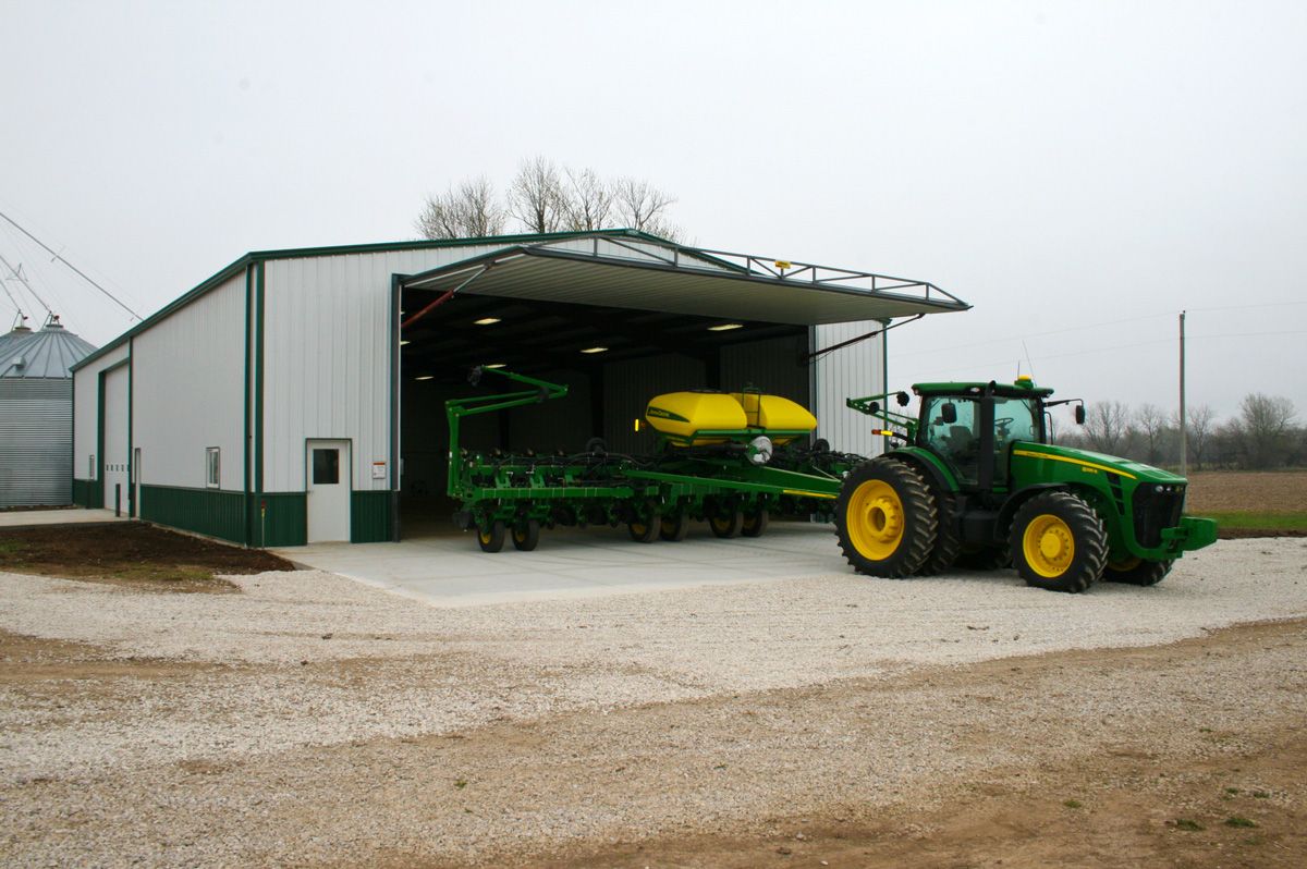 machinery storage building with extra large automated door for large farm equipment