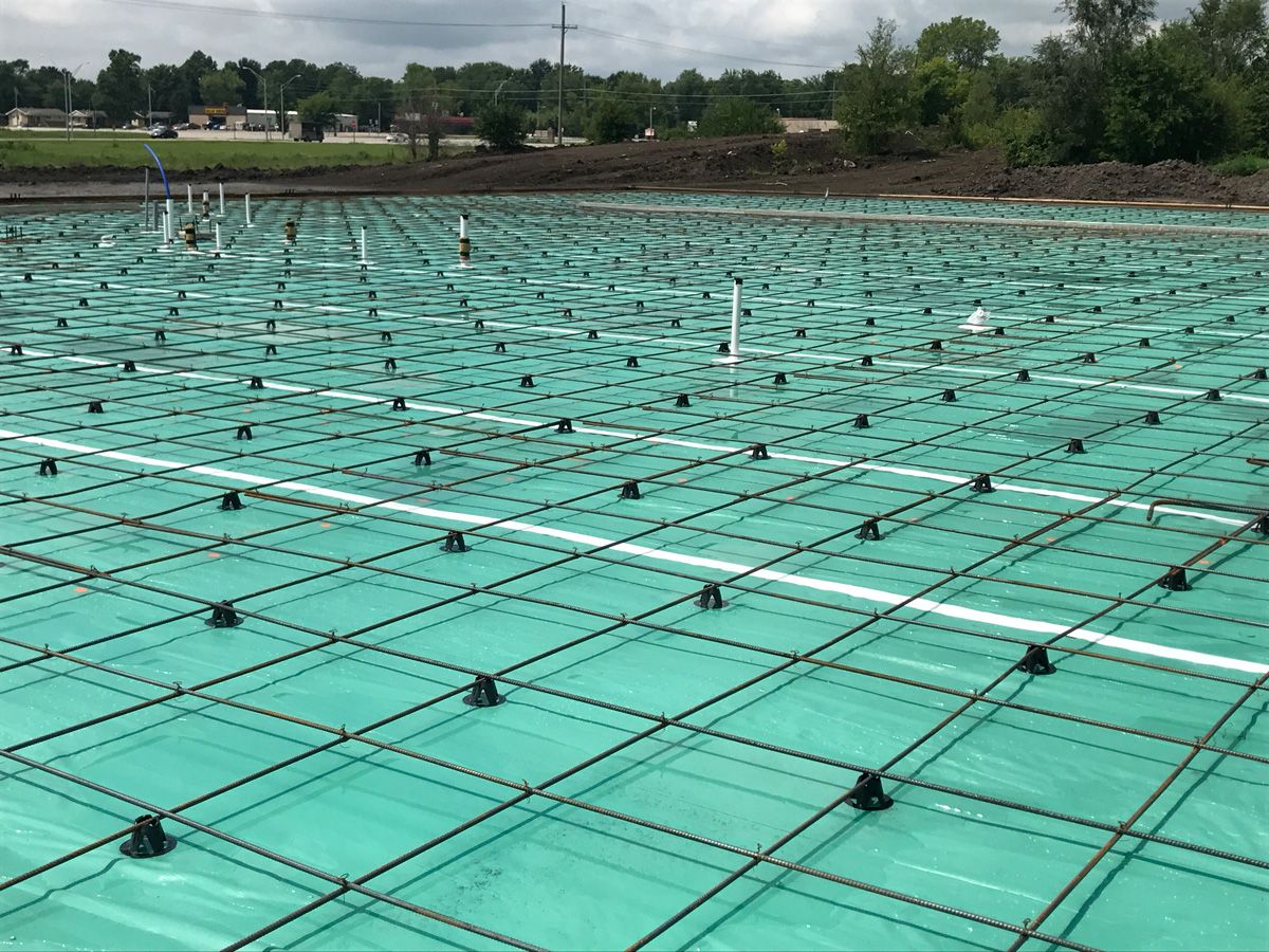 concrete foundation for auto dealership construction